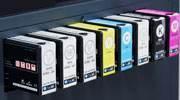 Set of B2 LED UV printer ink cartridges in various colors arranged in a row